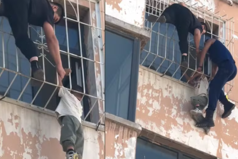 Menino de 5 anos é resgatado após ficar pendurado com a cabeça presa em janela no sexto andar na China